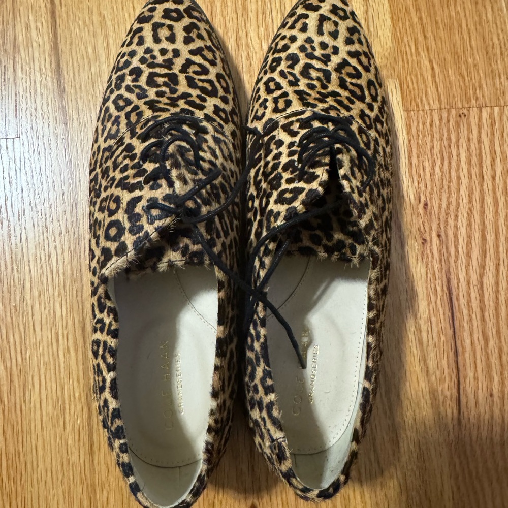 Cole Haan Leopard Print Lace-Up Flats in Black and Tan